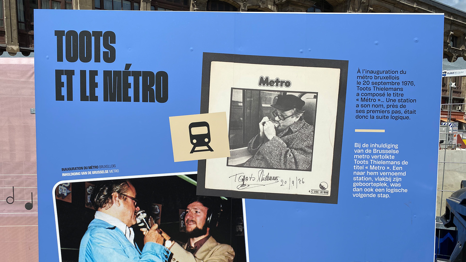Exhibition panels honoring Toots Thielemans at Brussels Metro 3 construction site